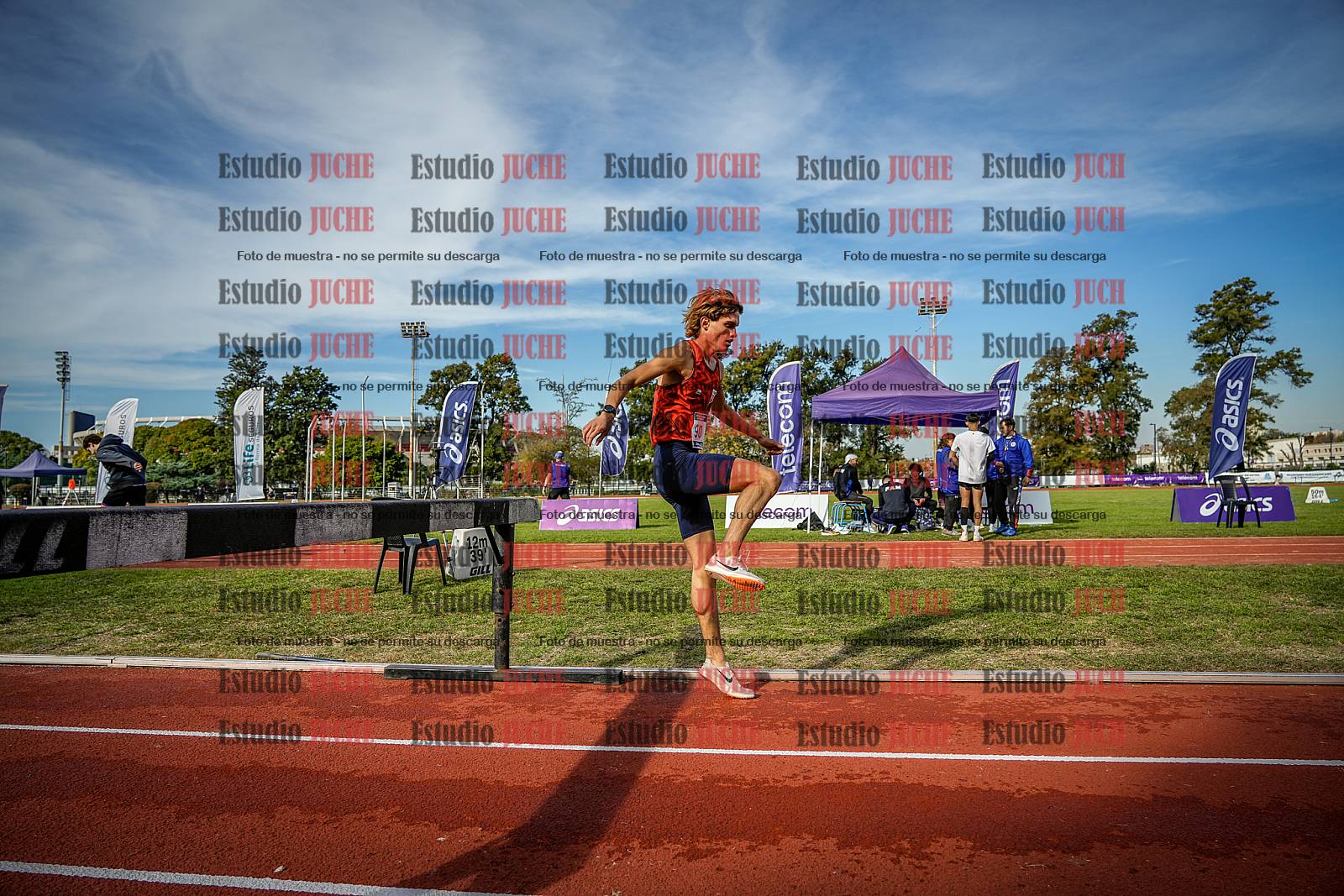 Fotos de los 3000 m con obstáculos de varones