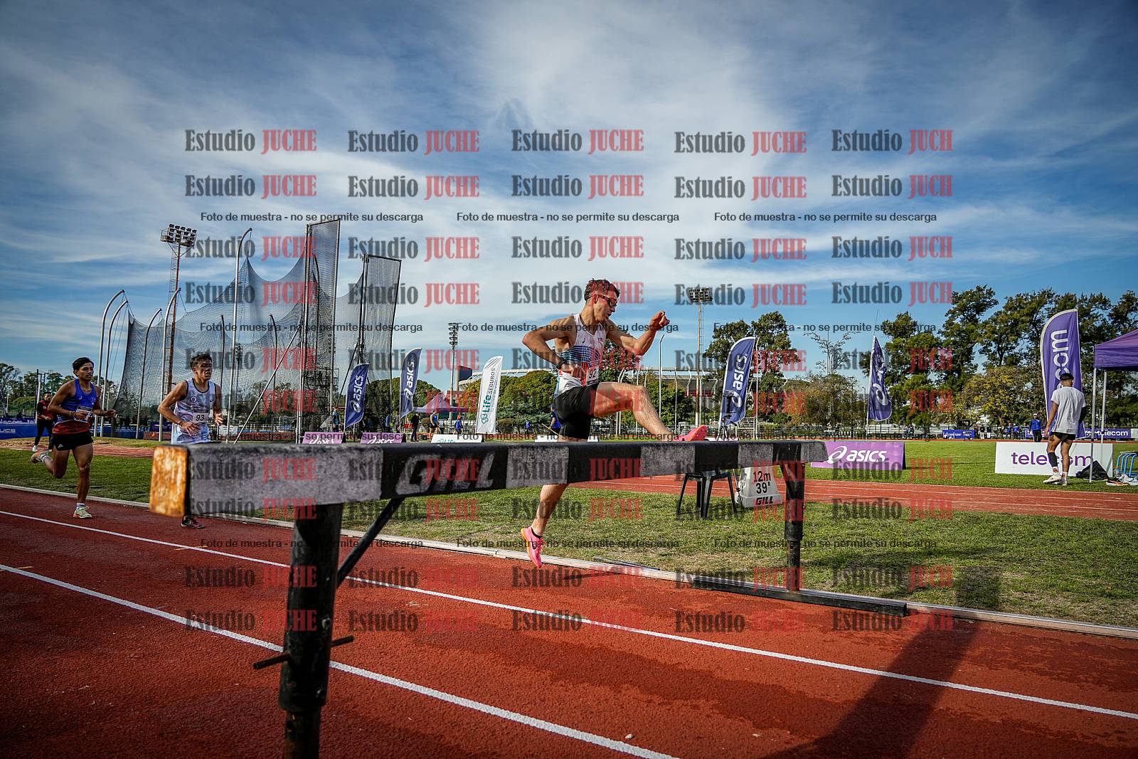 Fotos de los 3000 m con obstáculos de varones