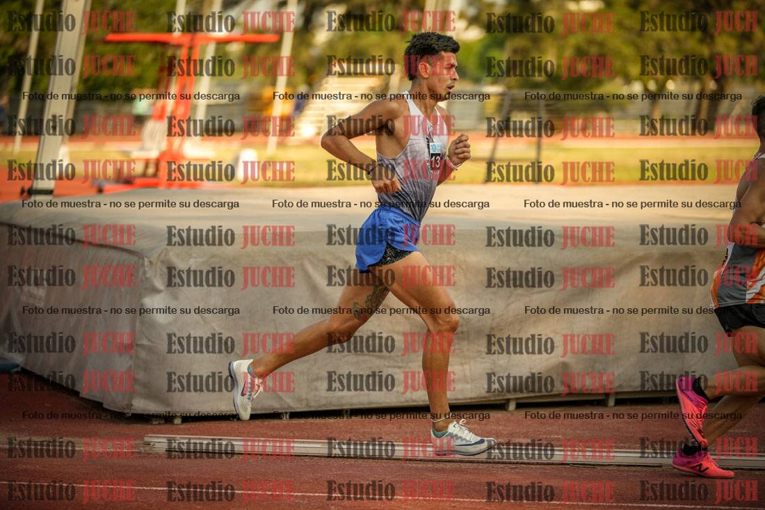 Fotos de los 5000 m llanos de mujeres y varones