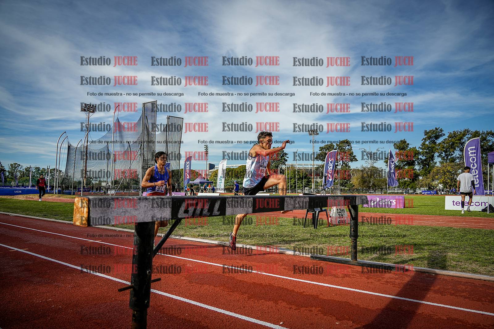 Fotos de los 3000 m con obstáculos de varones