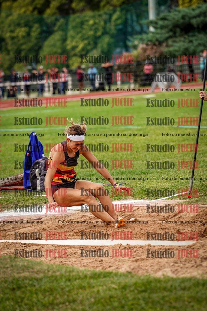 Fotos del salto triple de mujeres y varones