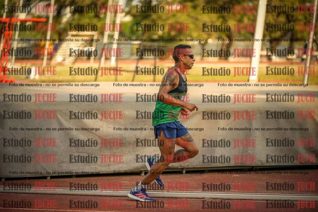 Fotos de los 5000 m llanos de mujeres y varones