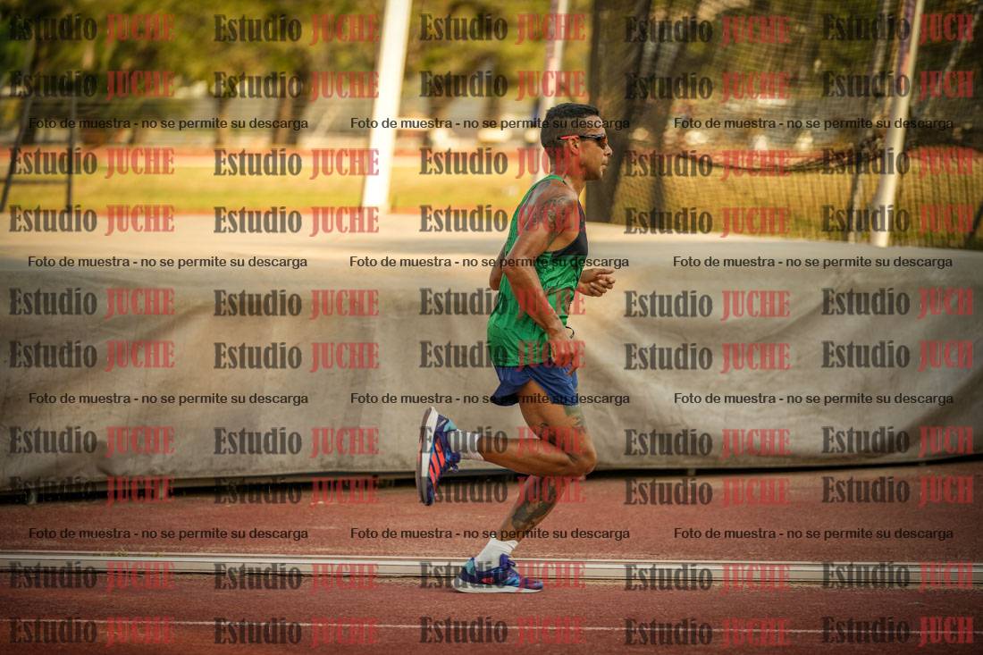Fotos de los 5000 m llanos de mujeres y varones