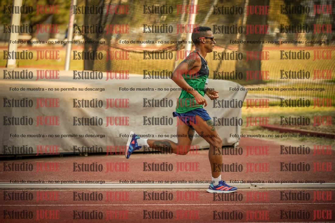 Fotos de los 5000 m llanos de mujeres y varones