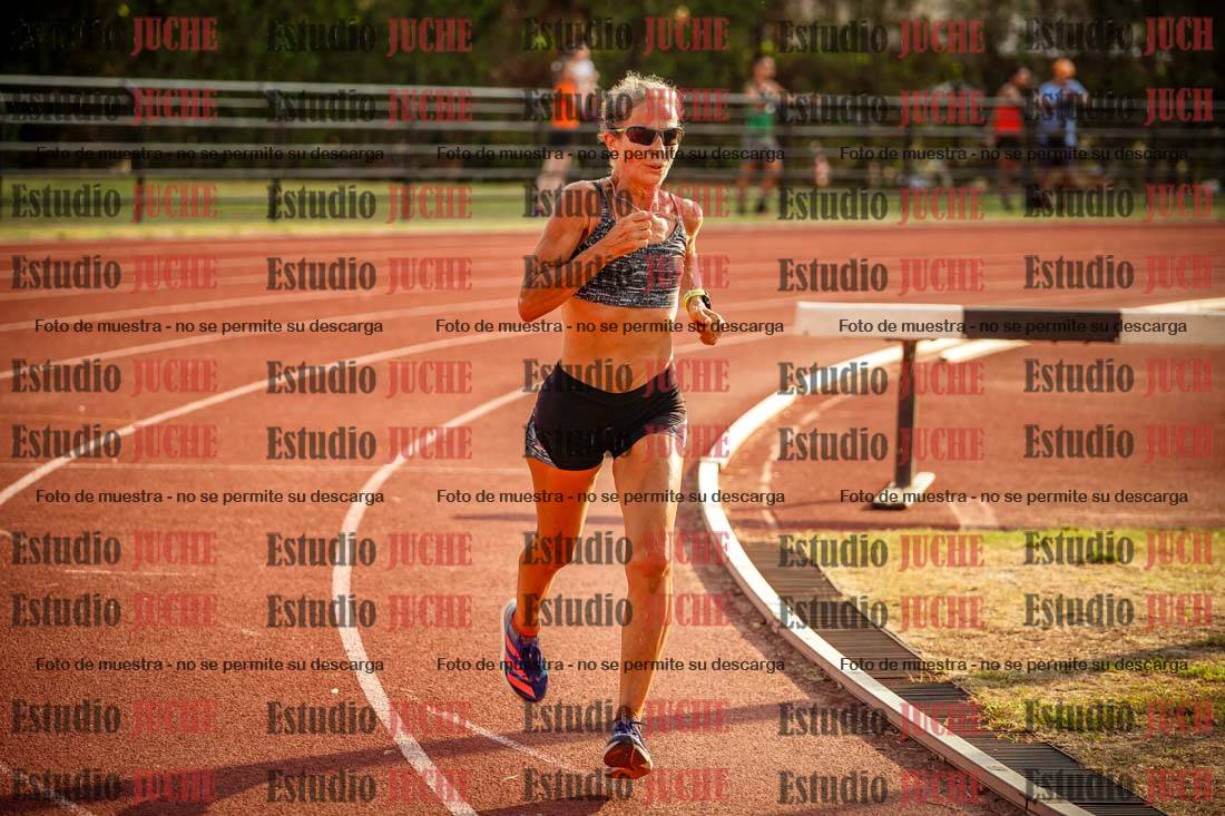Fotos de los 5000 m llanos de mujeres y varones