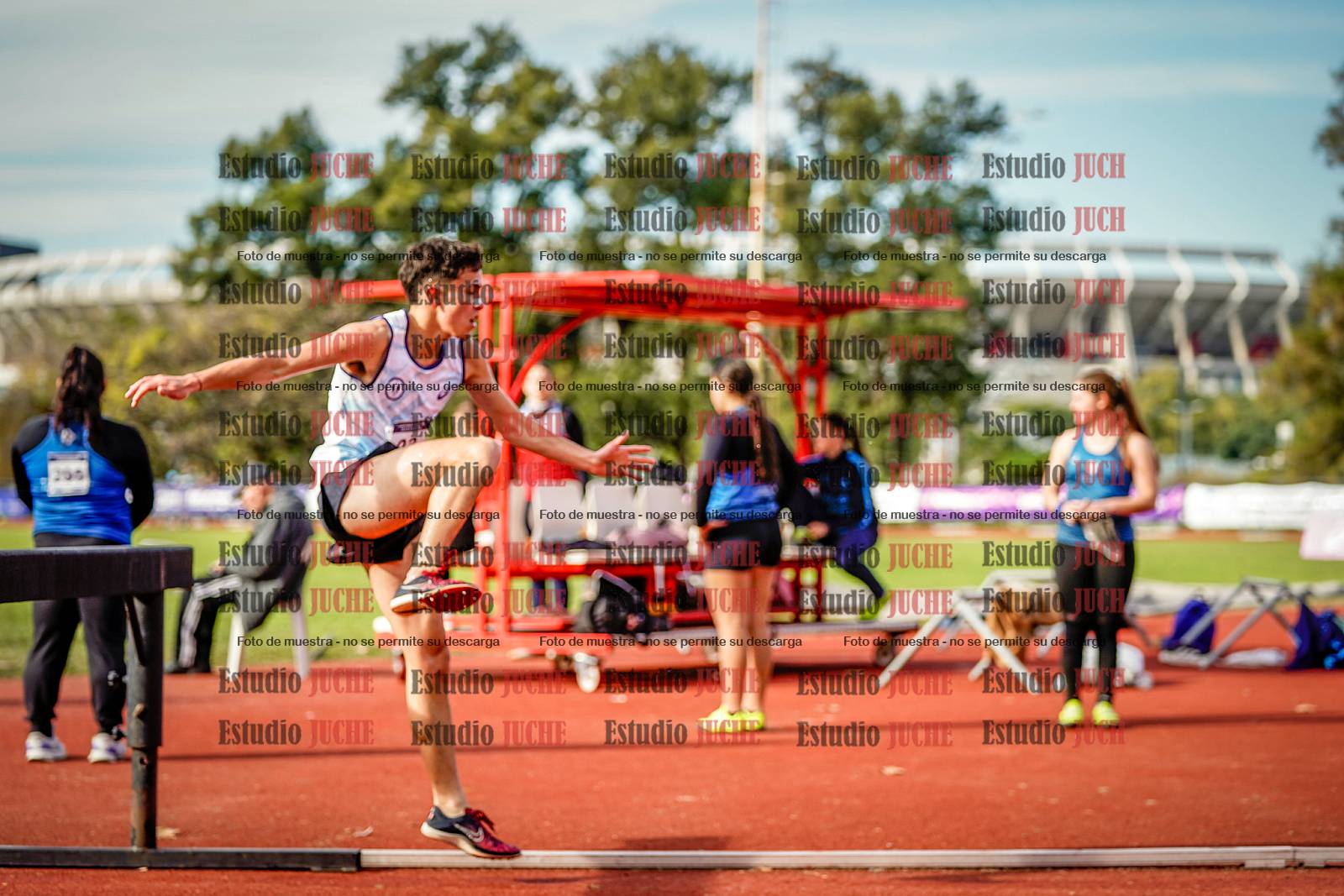 Fotos de los 3000 m con obstáculos de varones