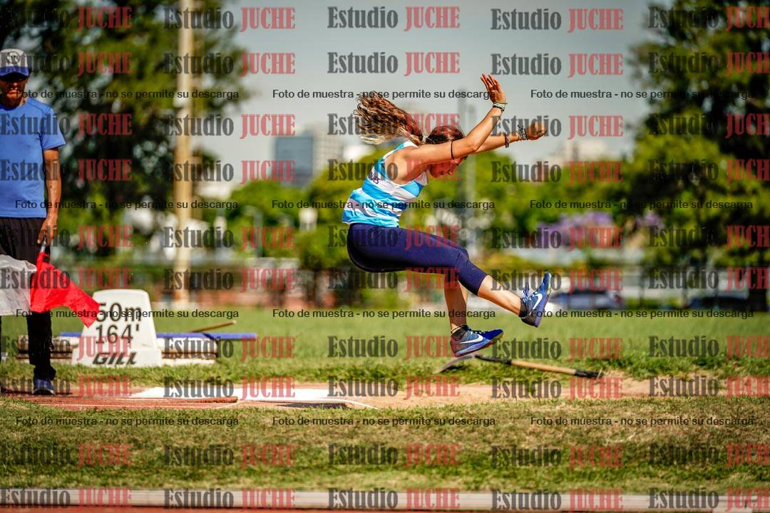 Fotos del salto en largo de mujeres