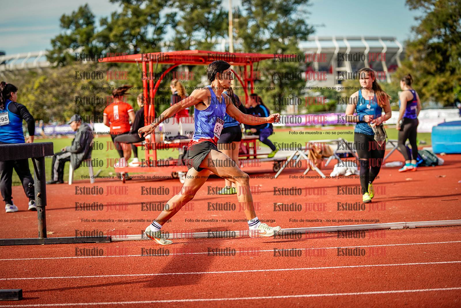 Fotos de los 3000 m con obstáculos de varones