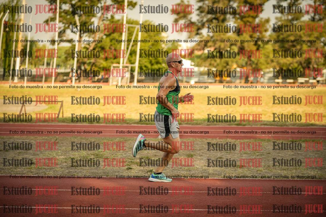 Fotos de los 5000 m llanos de mujeres y varones