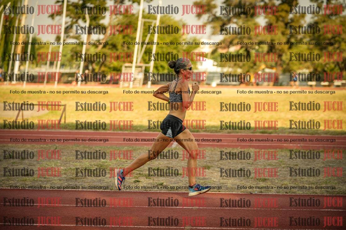 Fotos de los 5000 m llanos de mujeres y varones