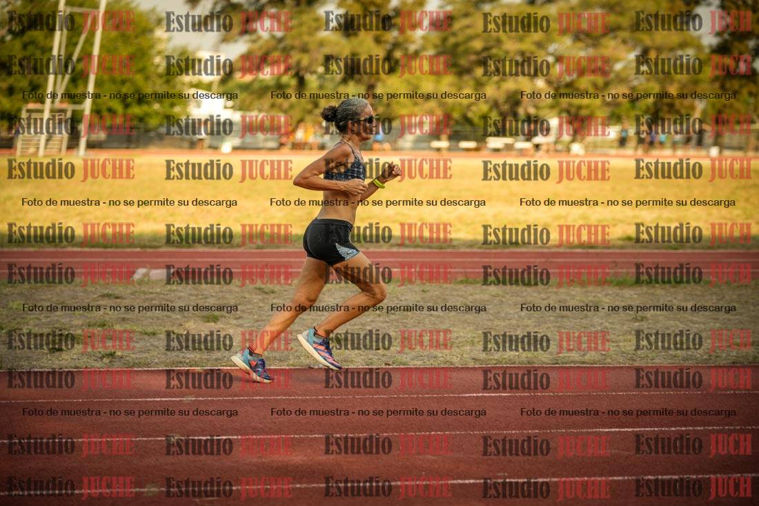 Fotos de los 5000 m llanos de mujeres y varones