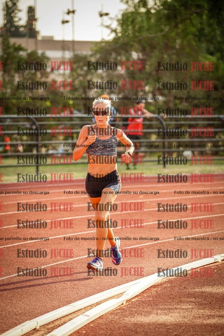 Fotos de los 5000 m llanos de mujeres y varones