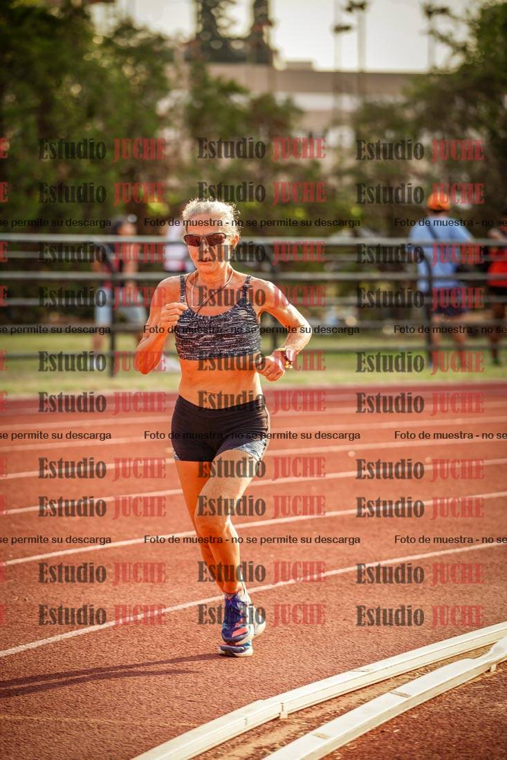 Fotos de los 5000 m llanos de mujeres y varones