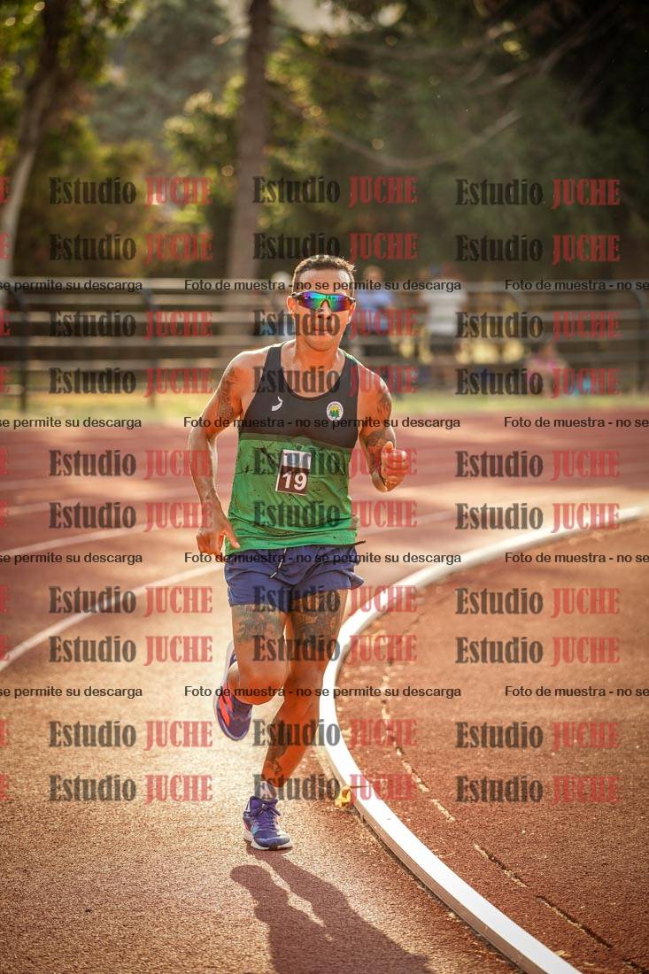 Fotos de los 5000 m llanos de mujeres y varones