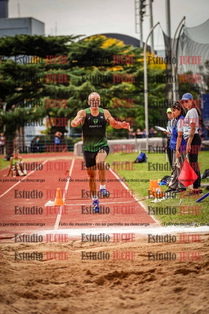 Fotos del salto triple de mujeres y varones