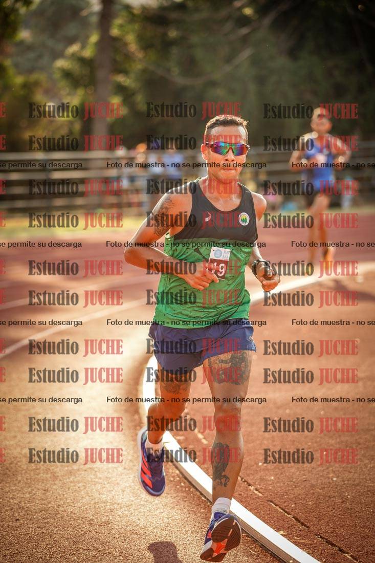 Fotos de los 5000 m llanos de mujeres y varones