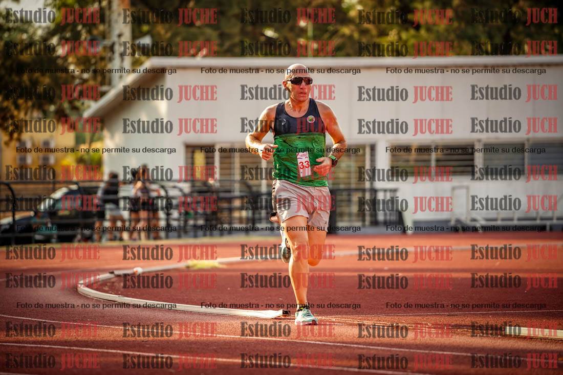 Fotos de los 5000 m llanos de mujeres y varones