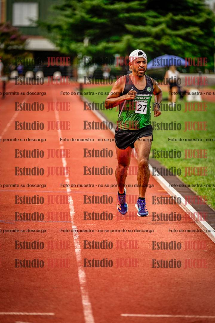 Fotos de los 3000 m con obstáculos de varones