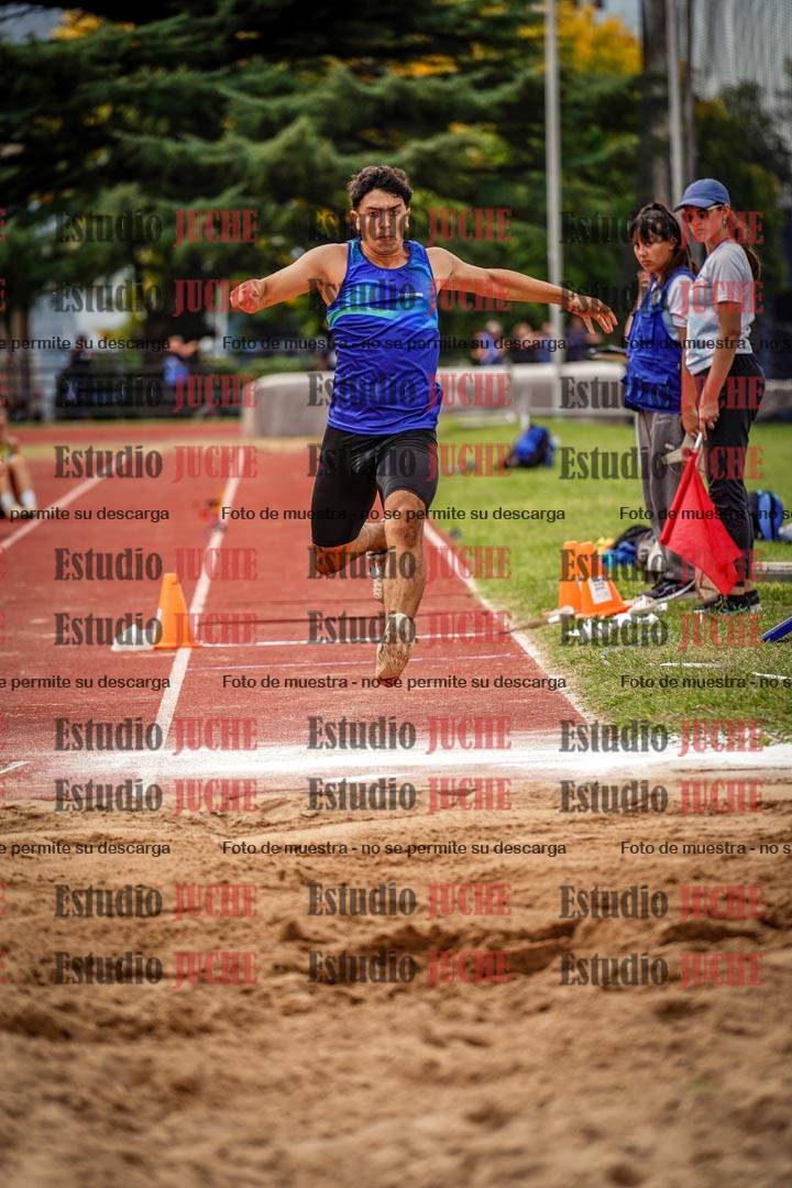 Fotos del salto triple de mujeres y varones