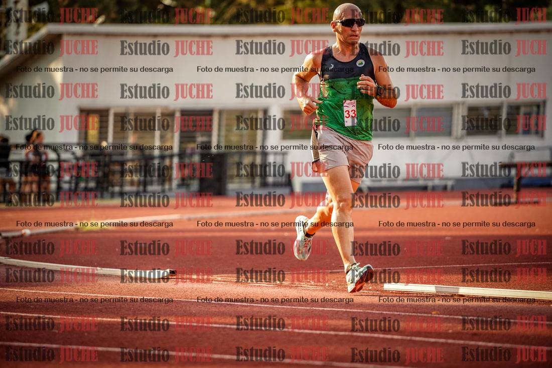 Fotos de los 5000 m llanos de mujeres y varones