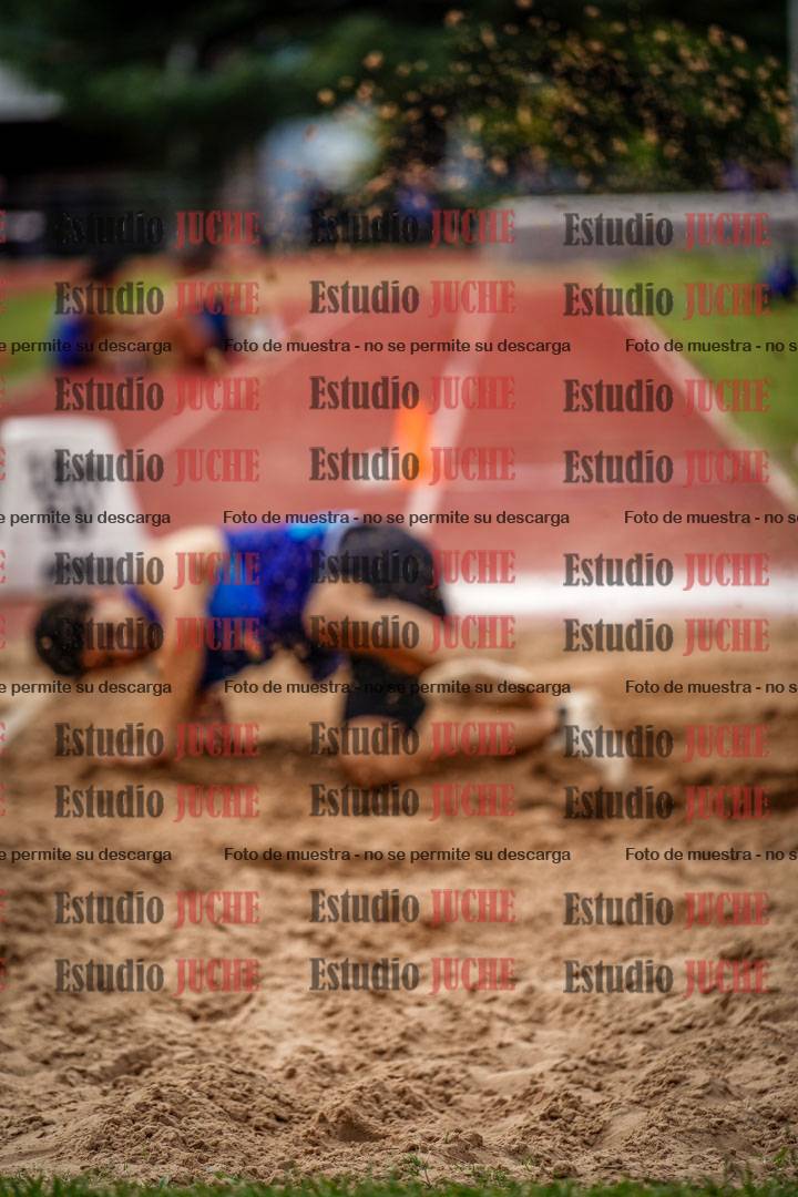 Fotos del salto triple de mujeres y varones
