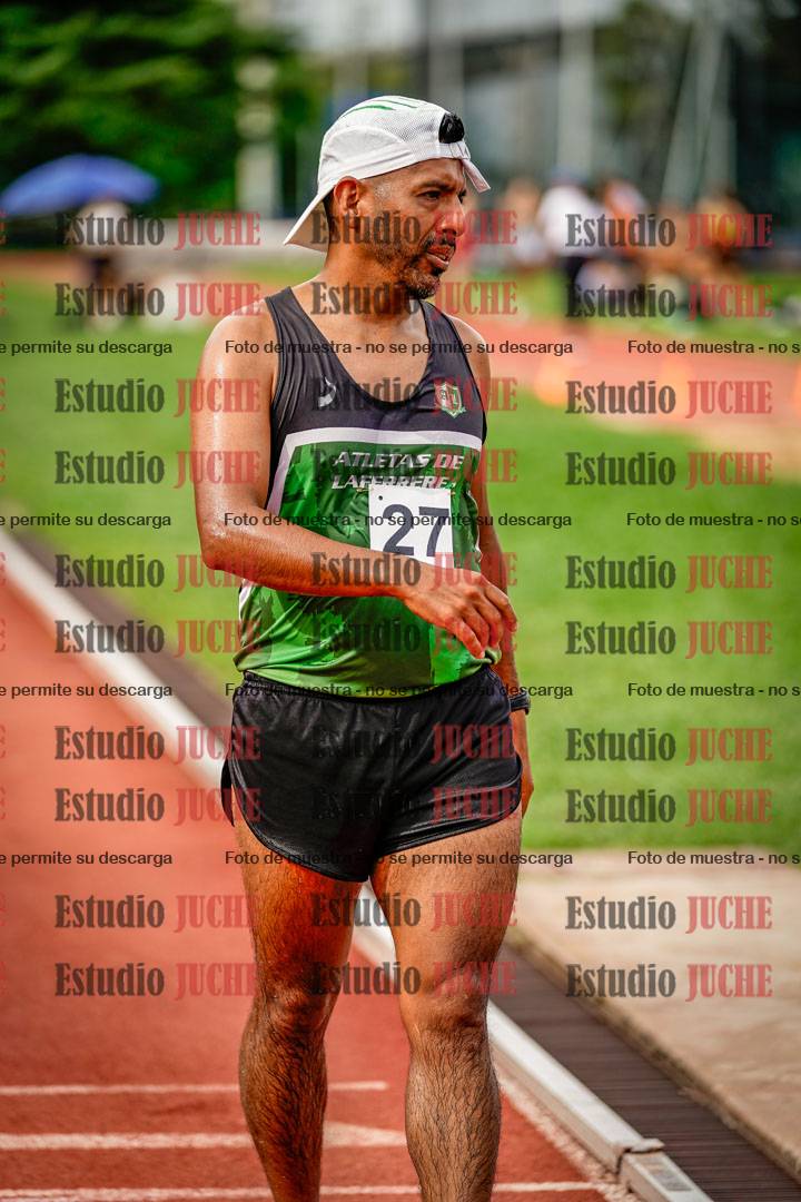 Fotos de los 3000 m con obstáculos de varones
