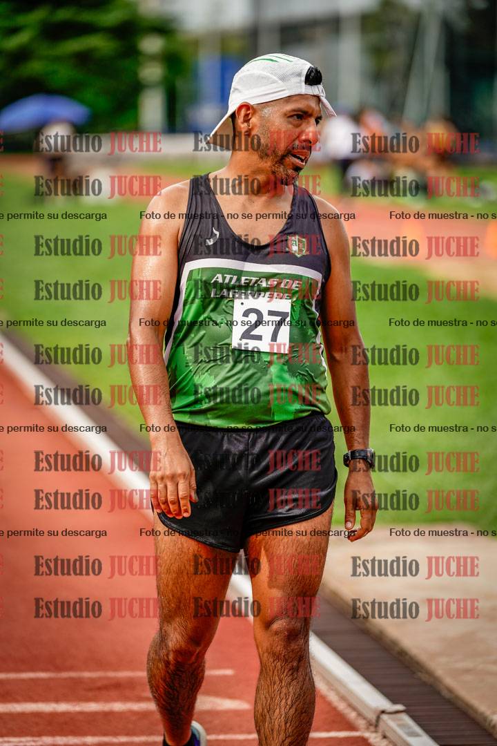 Fotos de los 3000 m con obstáculos de varones