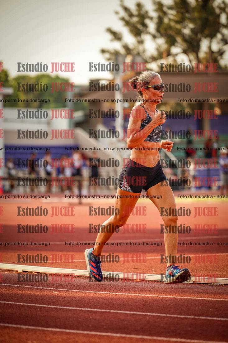 Fotos de los 5000 m llanos de mujeres y varones