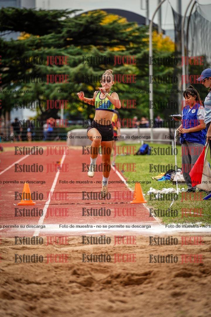 Fotos del salto triple de mujeres y varones