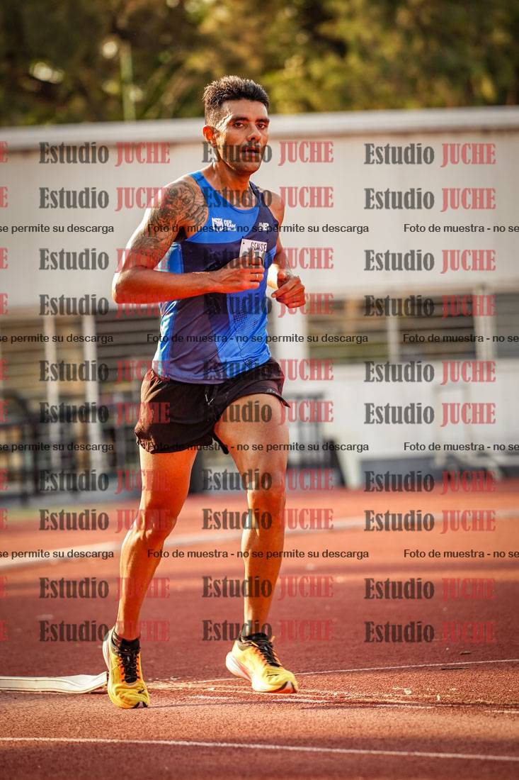 Fotos de los 5000 m llanos de mujeres y varones