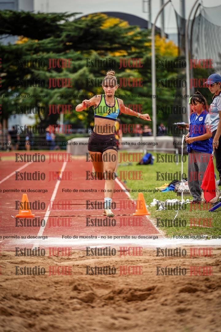Fotos del salto triple de mujeres y varones