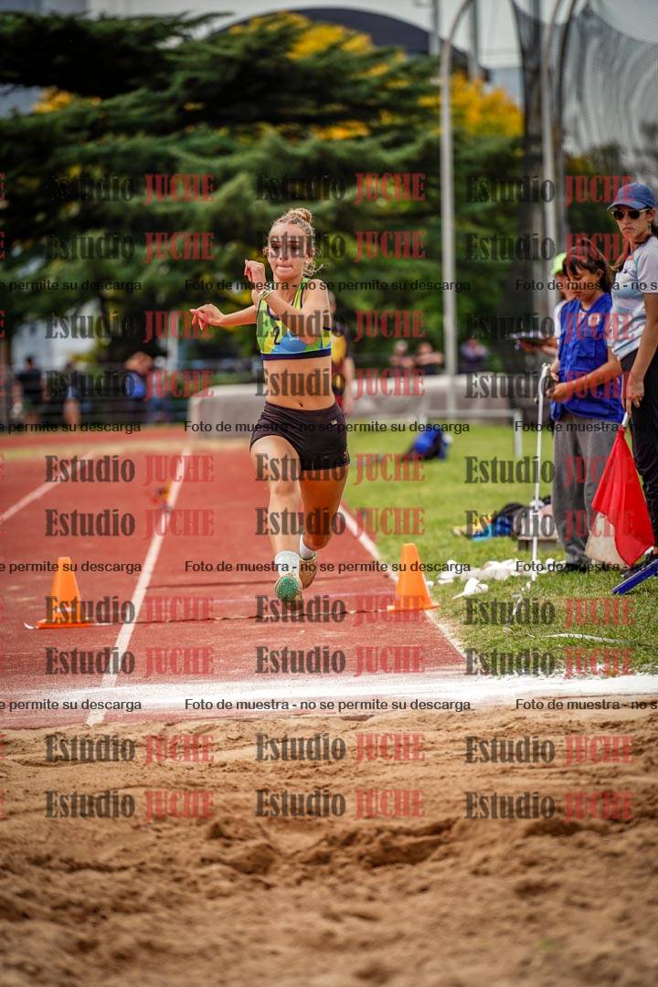 Fotos del salto triple de mujeres y varones