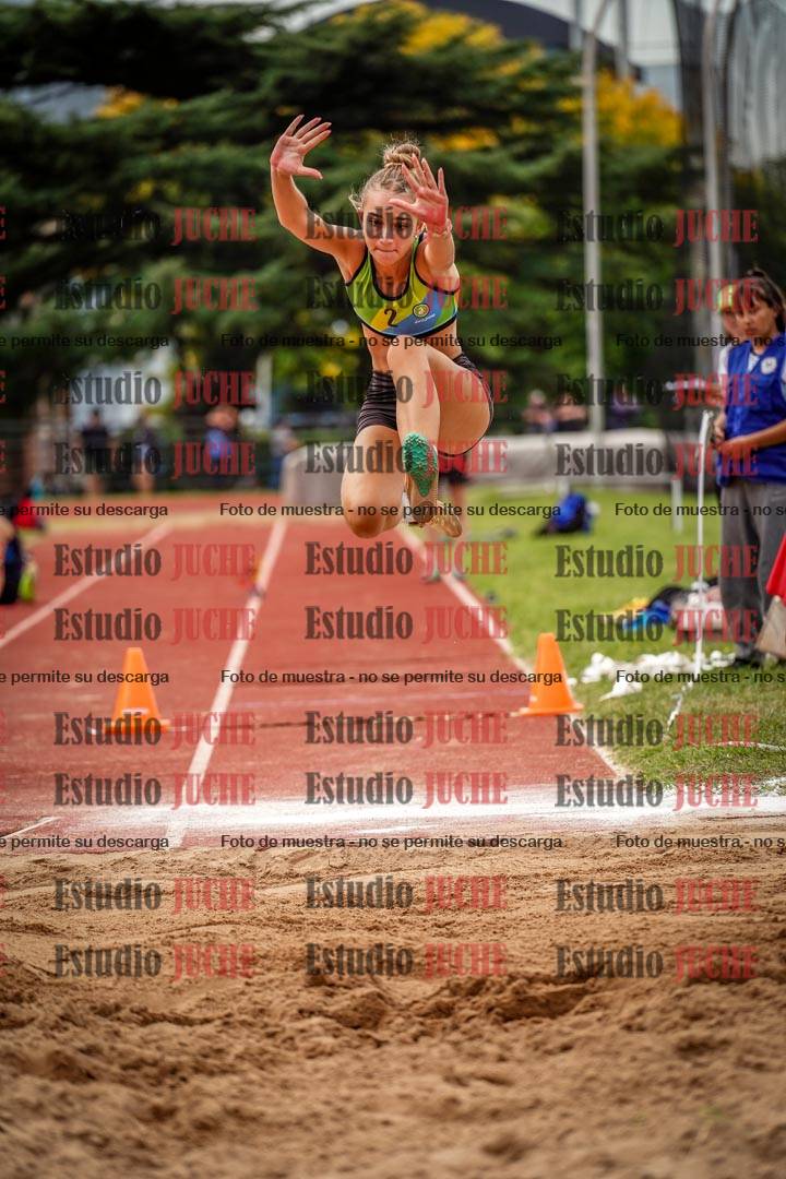 Fotos del salto triple de mujeres y varones
