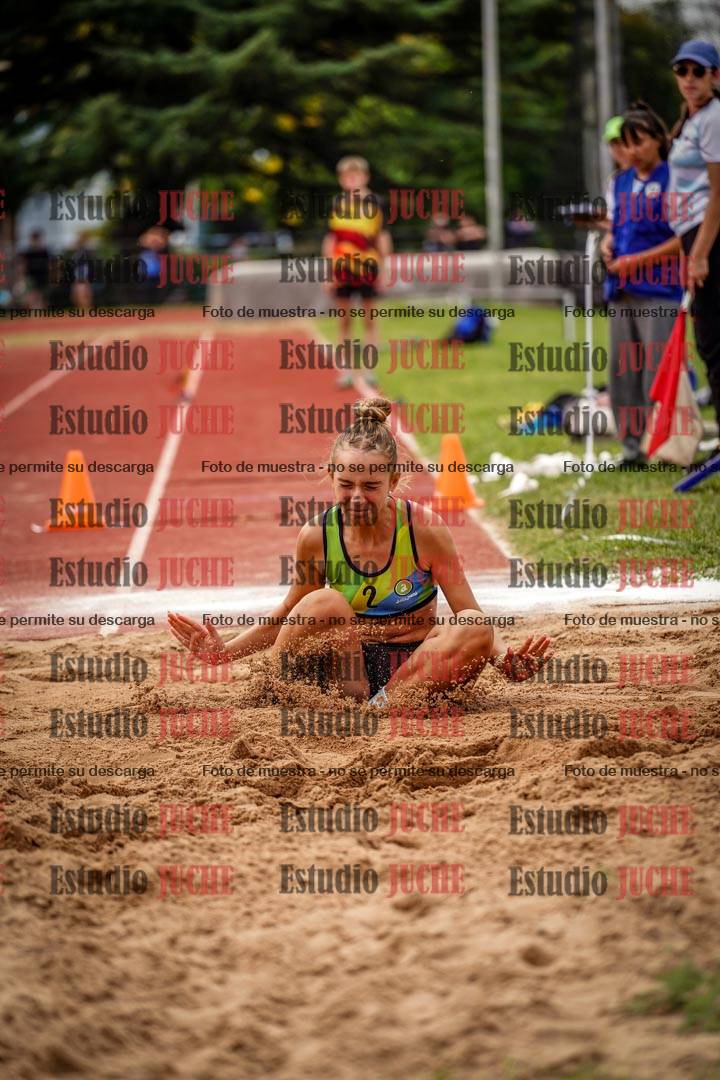 Fotos del salto triple de mujeres y varones