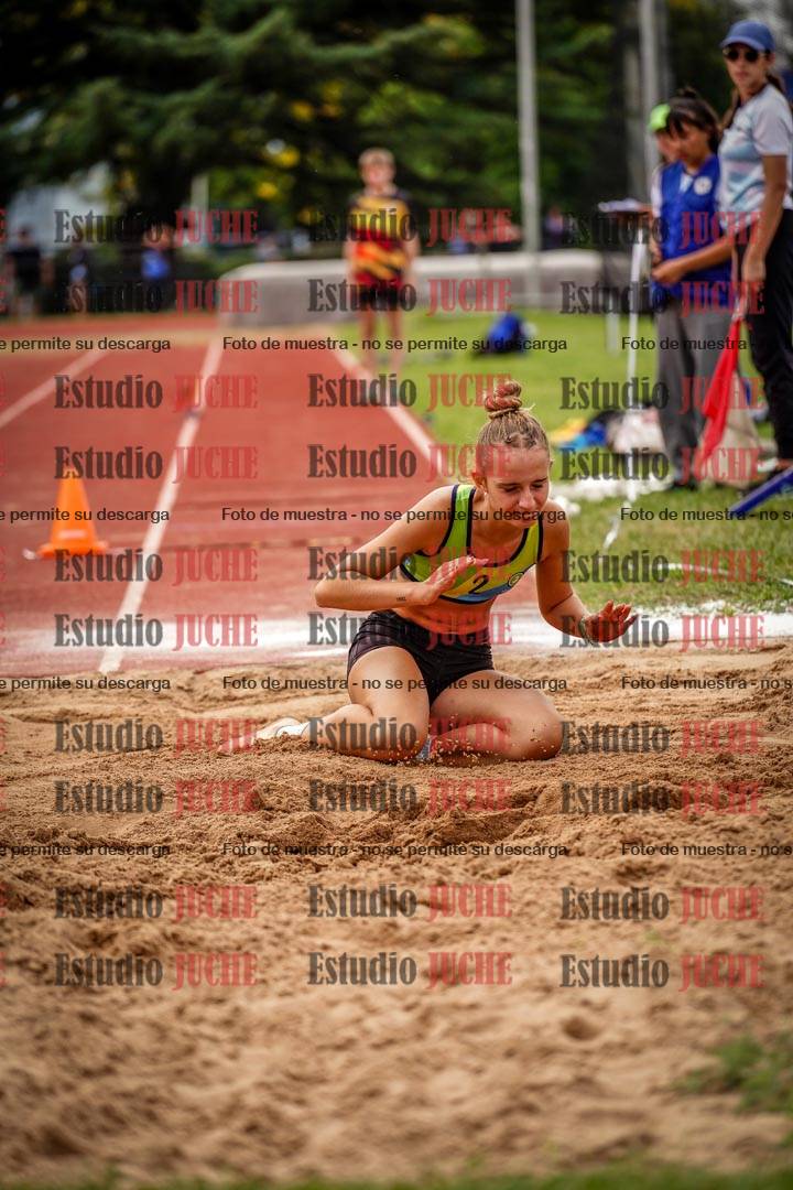 Fotos del salto triple de mujeres y varones