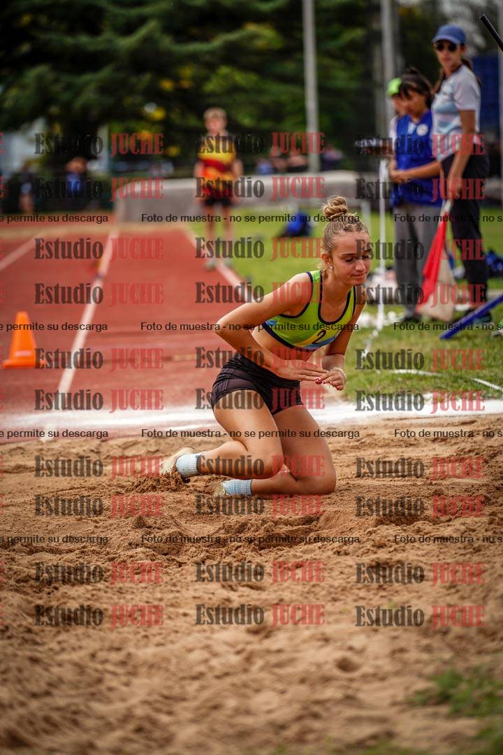 Fotos del salto triple de mujeres y varones