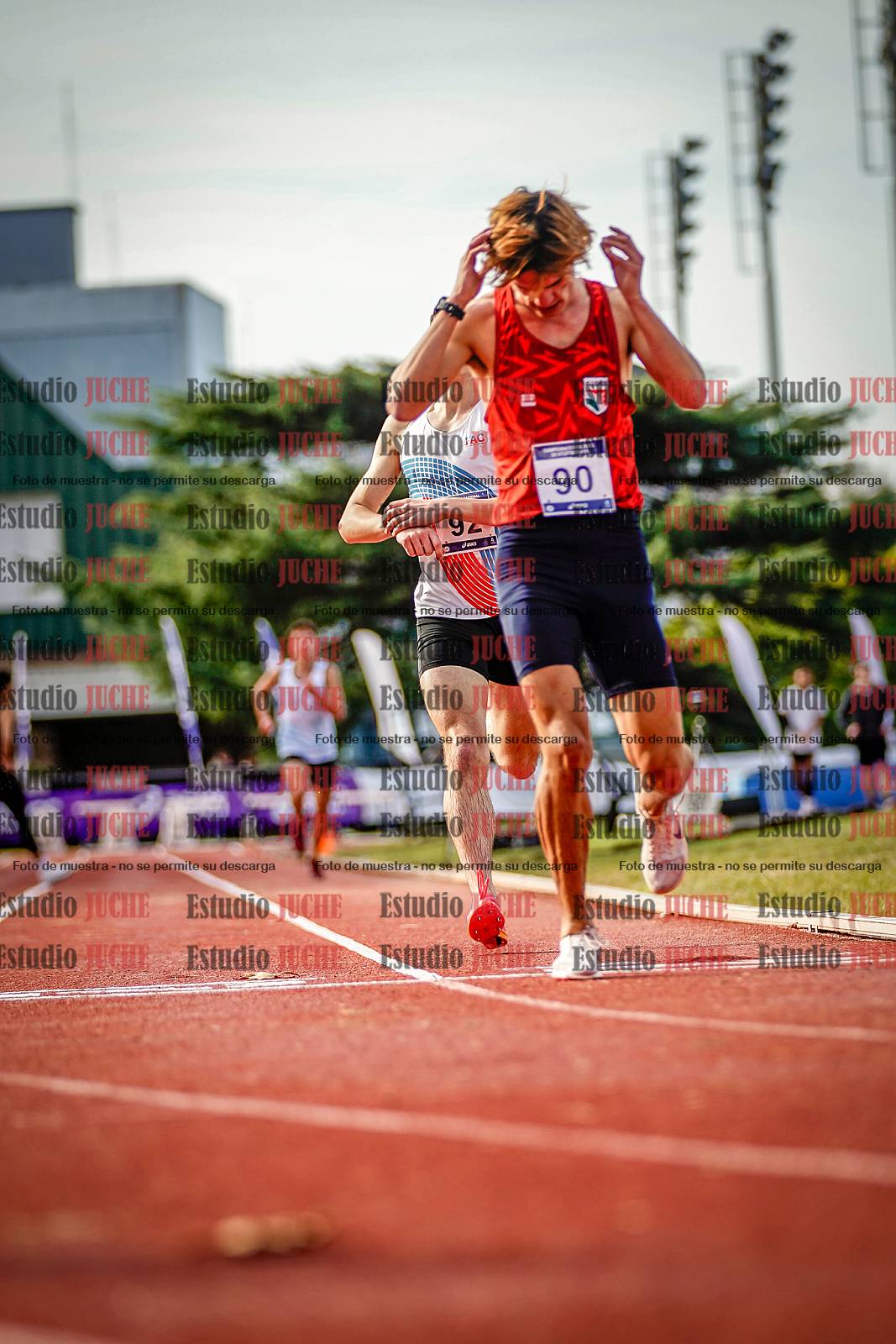 Fotos de los 3000 m con obstáculos de varones