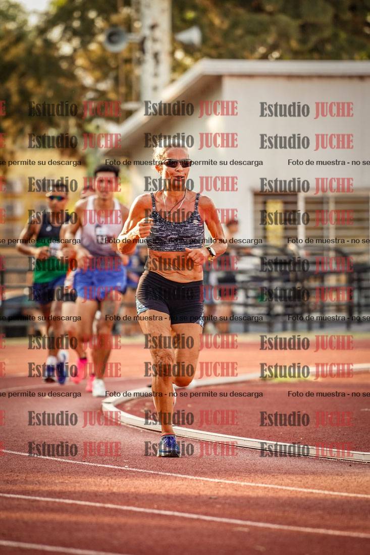 Fotos de los 5000 m llanos de mujeres y varones