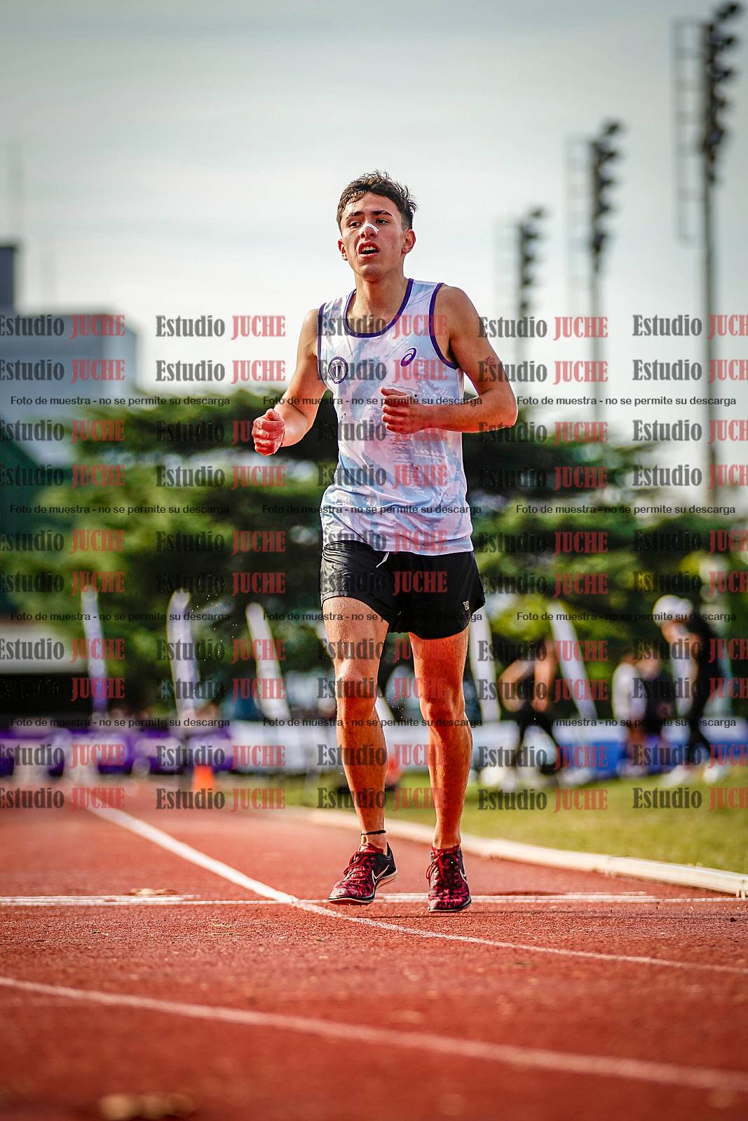 Fotos de los 3000 m con obstáculos de varones