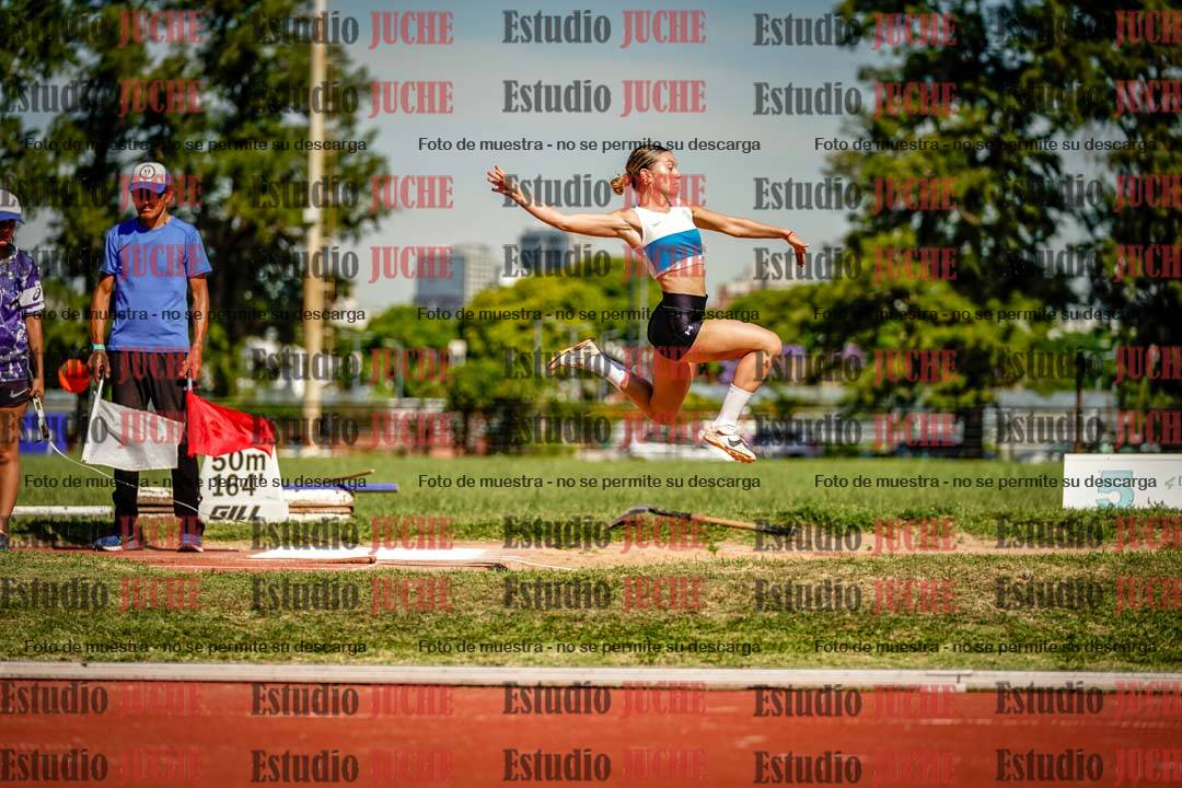 Fotos del salto en largo de mujeres