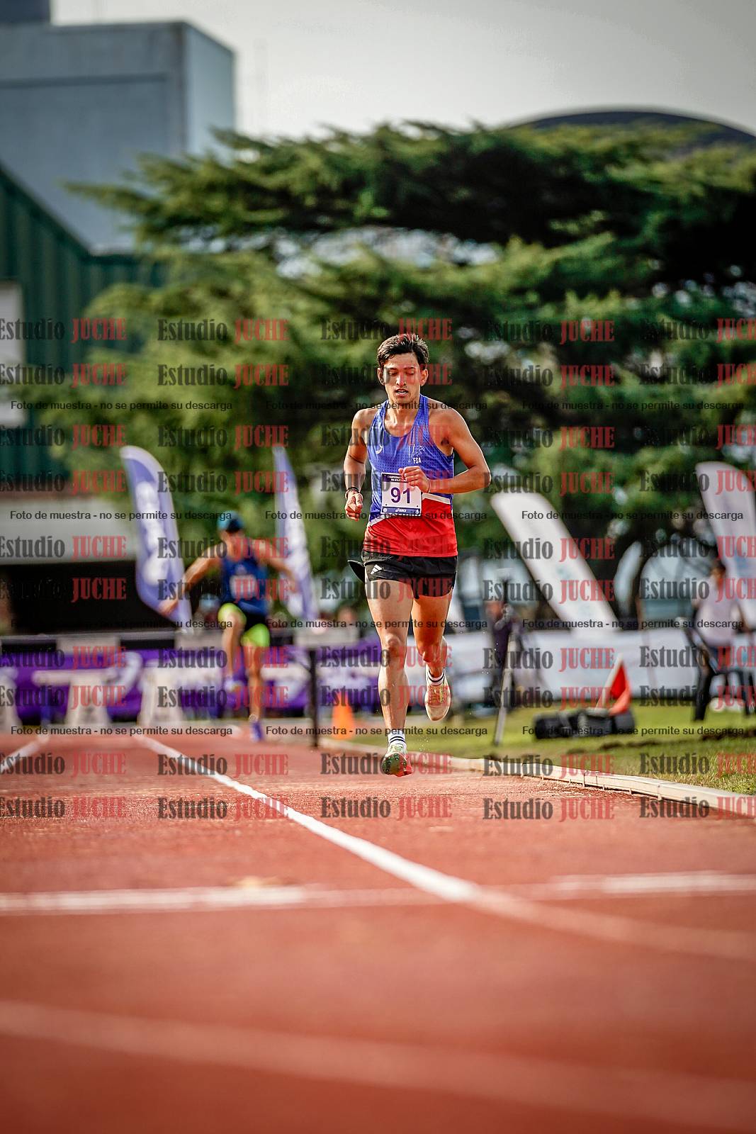 Fotos de los 3000 m con obstáculos de varones