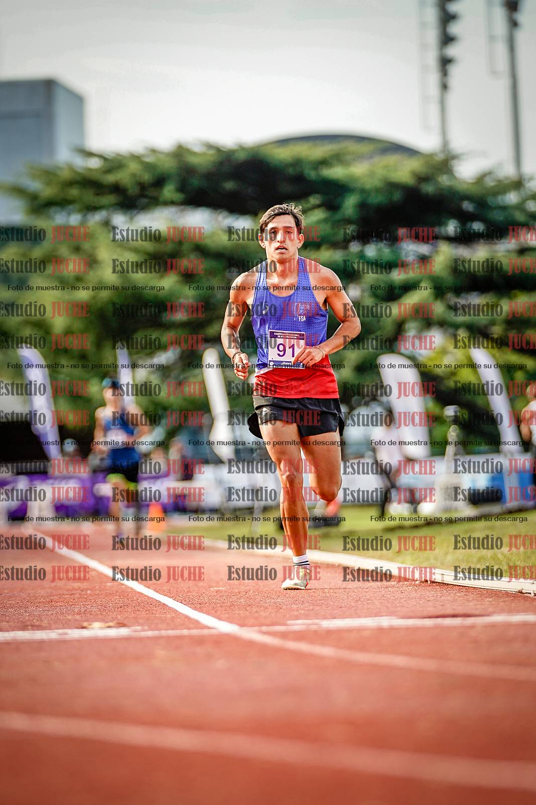 Fotos de los 3000 m con obstáculos de varones