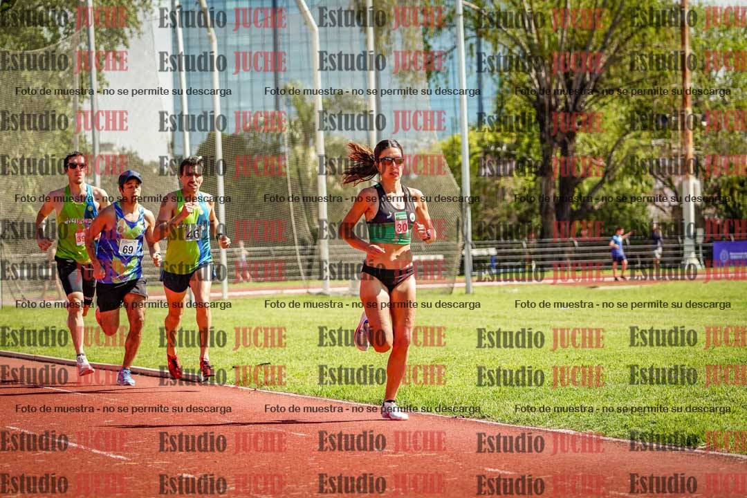 Fotos de los 5000 m llanos de mujeres y varones