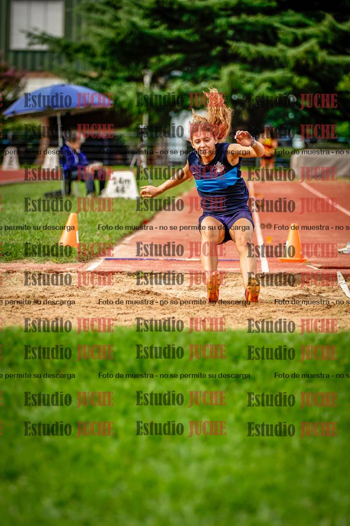 Fotos del salto en largo de mujeres