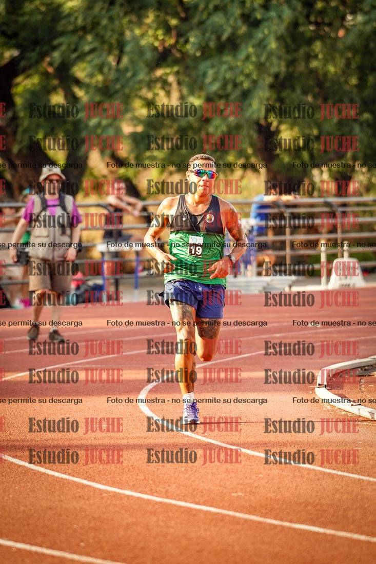 Fotos de los 5000 m llanos de mujeres y varones