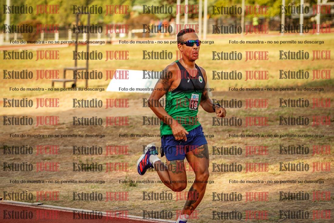 Fotos de los 5000 m llanos de mujeres y varones