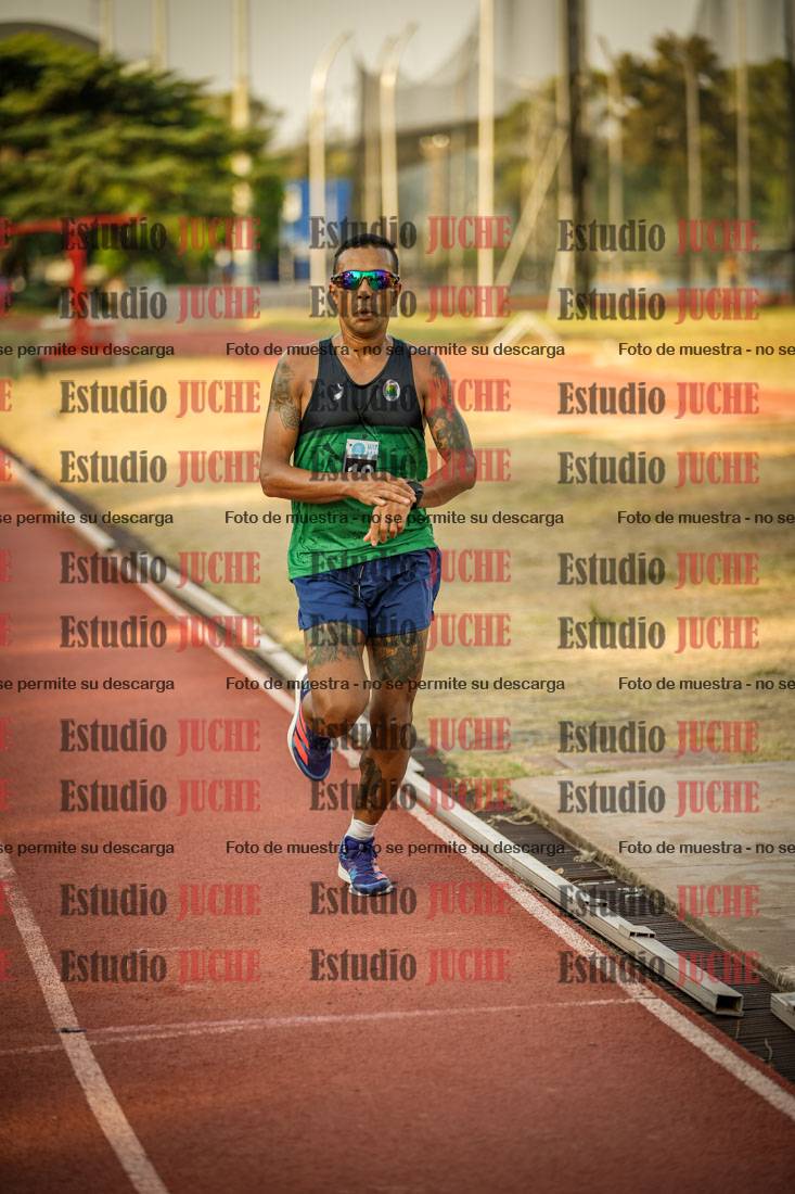 Fotos de los 5000 m llanos de mujeres y varones