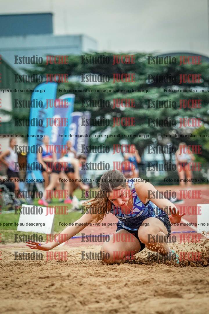 Fotos del salto en largo de mujeres