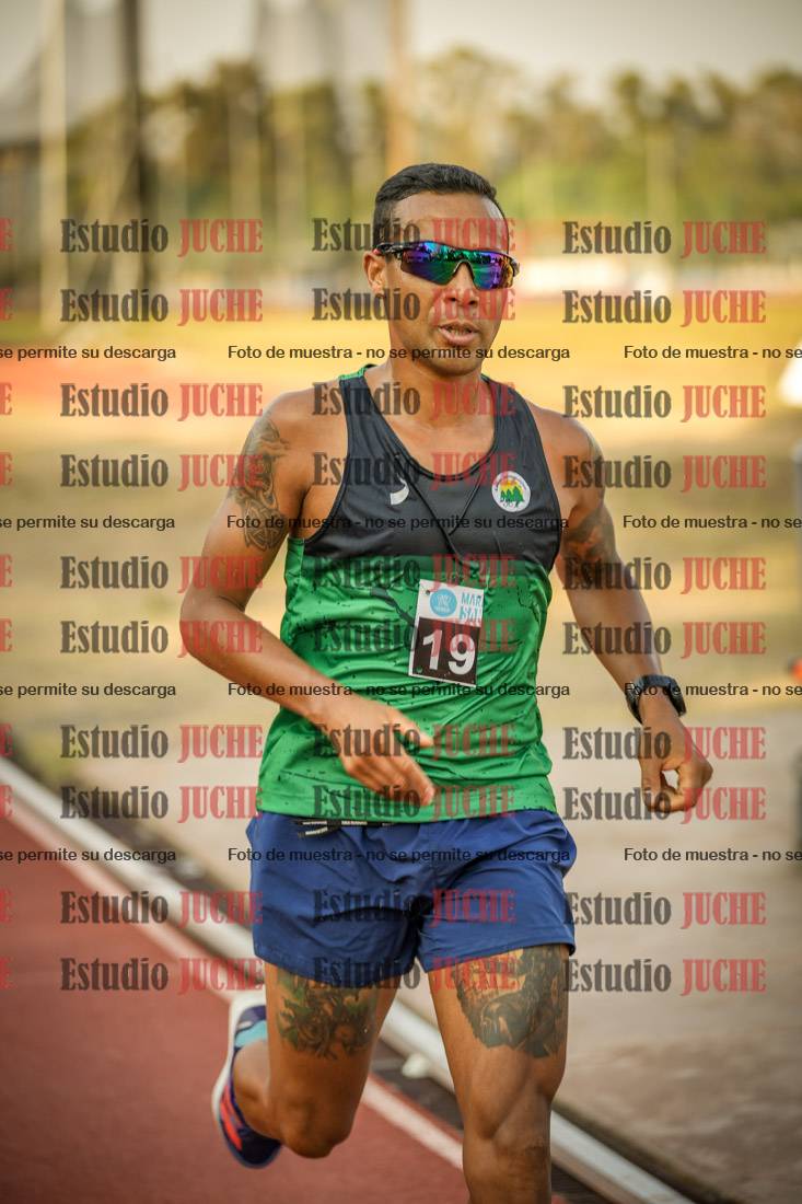 Fotos de los 5000 m llanos de mujeres y varones