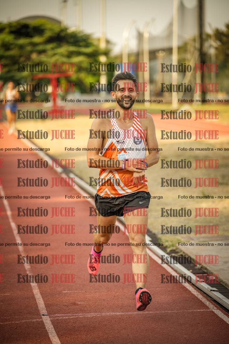 Fotos de los 5000 m llanos de mujeres y varones